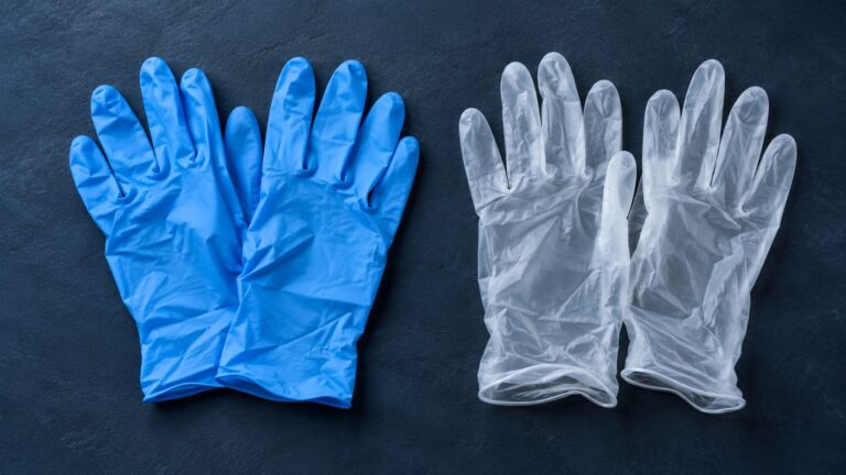 Illustration of blue nitrile and translucent vinyl gloves